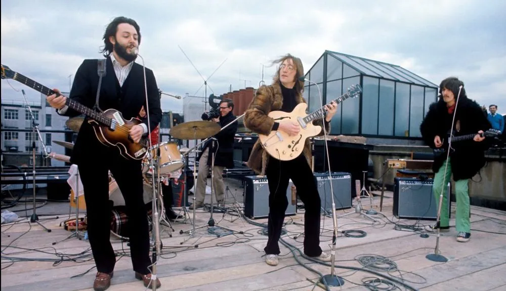 The-Beatles-Apple-rooftop-Jan-30-1969_Ethan-A.-Russell-Apple-Corps-Ltd-e1629950207742